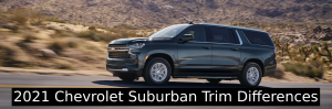 Front side view of Suburban driving with trim difference lettering